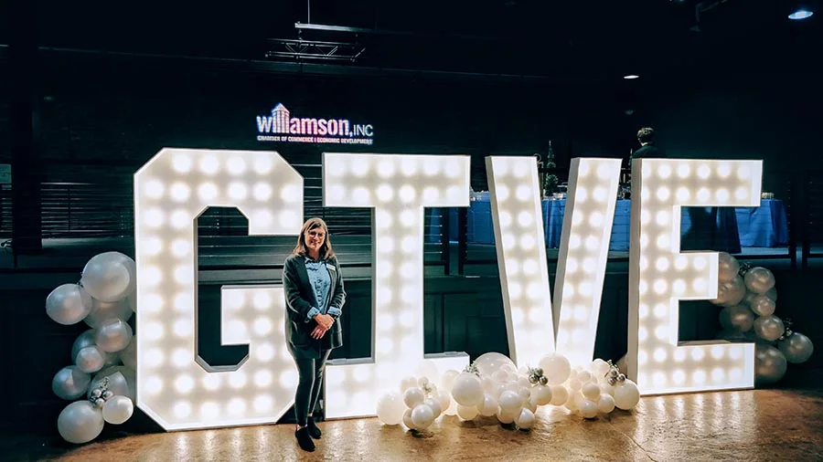 GIVE marquee letters in Brentwood with white balloons