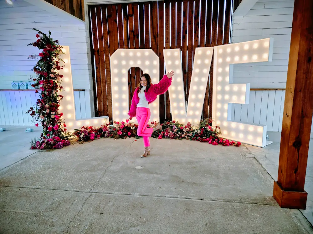 Giant LOVE marquee letters with floral decor at a North Alabama wedding