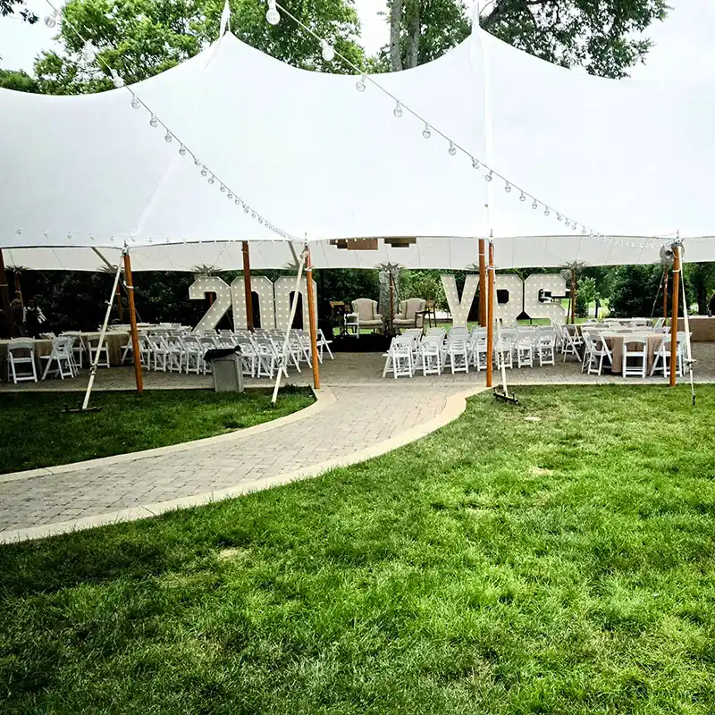 Custom 200 YRS light-up marquee letters for a wedding pre-party