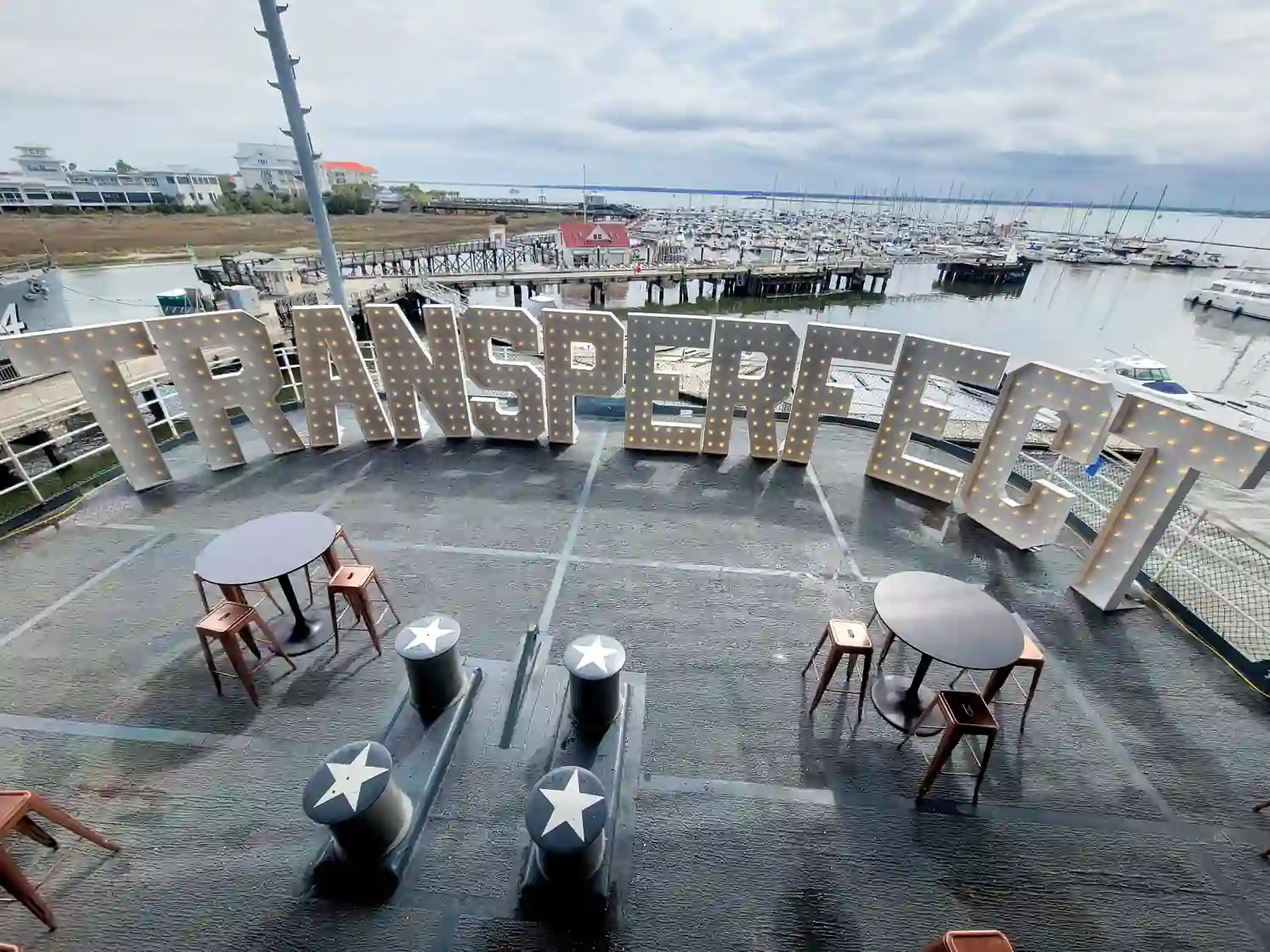 Light up letters for business events spelling "TransPerfect" at a corporate event