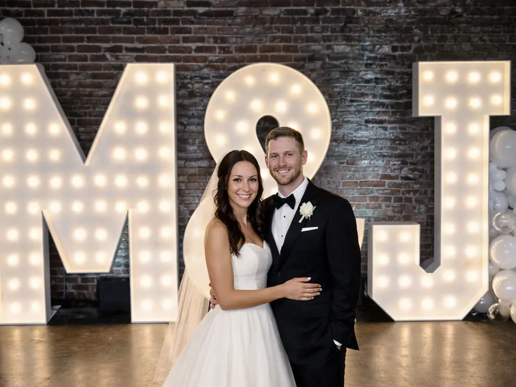 7ft marquee letters M and J with white pearl balloon garland at Acme Feed and Seed Nashville wedding
